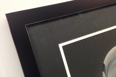 black picture frame with silver trim